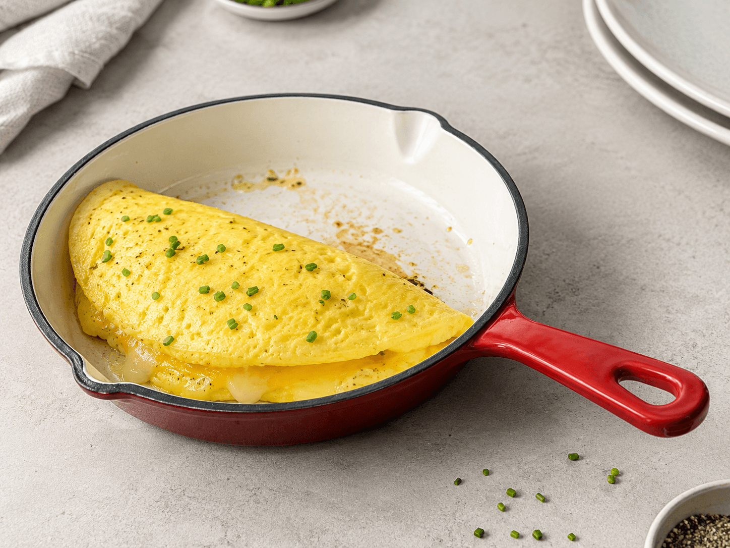 Dual red omelette pan
